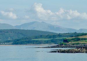 Snowdon, as seen from Anglesey (photo by Laurence Perkins)
